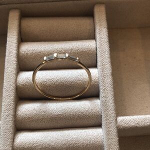 14K Gold Ring with three emerald cut CZ diamonds